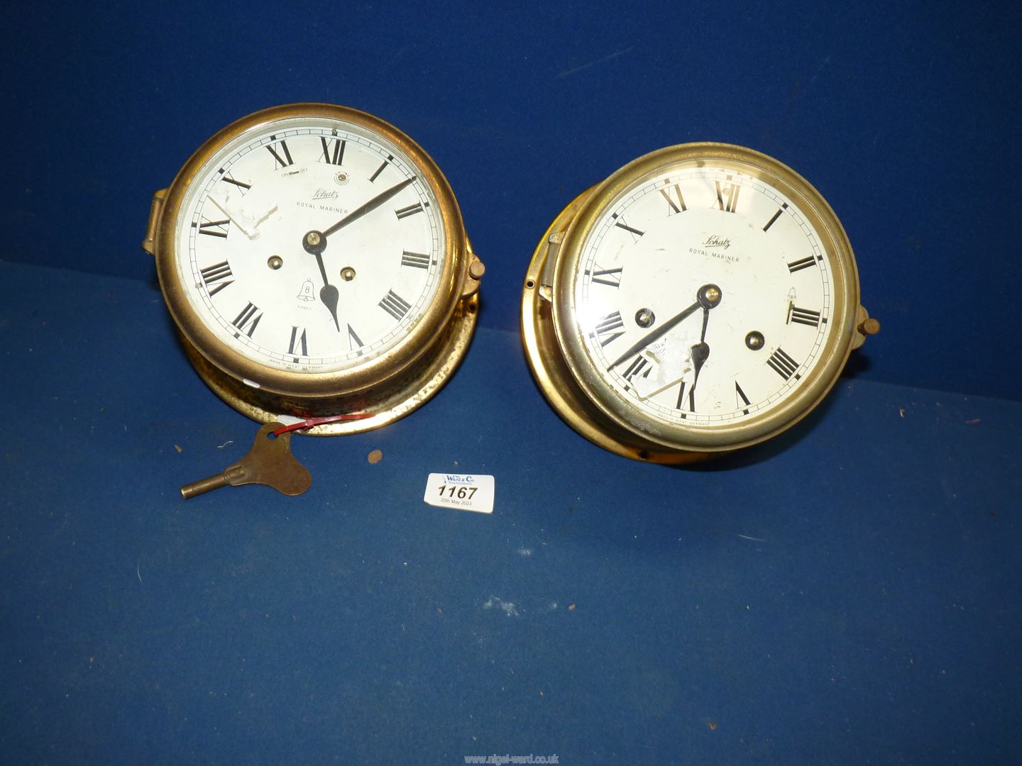 Two Schatz Royal Mariner mechanical clocks with keys, 7" diameter.