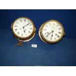 Two Schatz Royal Mariner mechanical clocks with keys, 7" diameter.