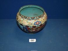 A Cloisonne bowl profusely decorated depicting exotic birds (small losses to enamel),