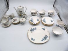 A six piece child's Teaset with scenes of ladies to include teapot, six cups and saucers,