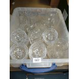 A large quantity of glass including four rose vases and glass trinket bowls and a quantity of