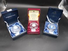 Three boxed Wedgwood glass Paperweights with carved centres to include;