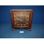 A square faced and cased Oak Mantle Clock (unglazed) with art deco style Arabic numerals on dark