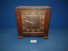 A square faced and cased Oak Mantle Clock (unglazed) with art deco style Arabic numerals on dark