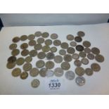 A quantity of sixpences 1906-1967 and a small quantity of silver threepences 1913-1938.
