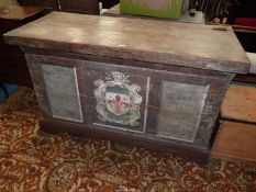 A most unusual and primitive Chest having painted detail to the front including Heraldic crest with