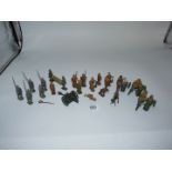 A quantity of lead WWI army figures including bugler, drummer, stretcher bearers,