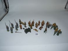 A quantity of lead WWI army figures including bugler, drummer, stretcher bearers,