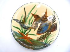A large slipware Charger with fish detail, 14" diameter.