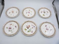A set of six 19th century East German porcelain plates with pierced rims and an Eagle mark.