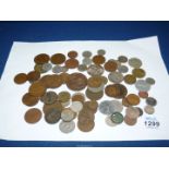 Miscellaneous foreign coins, old pennies, half pennies, sixpences, three pence pieces,