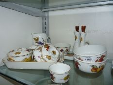 A quantity of Royal Worcester Evesham including three bowls, ramekins, two vinegar bottles,