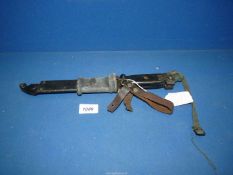 A German AK47 Bayonet with belt loop and wire cutting tool.