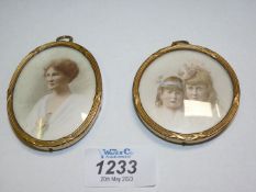 Two miniature Watercolour portraits; one of a lady with brown hair, the other of two young girls.
