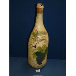 A large bottle of Castelfiora Rosso Conero wine, wax seal intact, 18 1/2'' high.