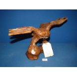 A carved hardwood sculpture of an Eagle, very well executed, possibly from Black Forest Craftsmen,