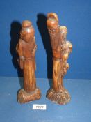 Two Chinese carved figures of a man and woman, 10 1/2" tall.