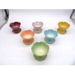 A set of six Beswick lustreware floral petal dessert bowls in various colours.