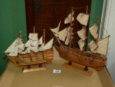 Two small wooden models of H.M.