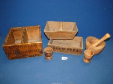 A quantity of treen including advertising boxes 'May Queen Margarine' and 'Bovril',