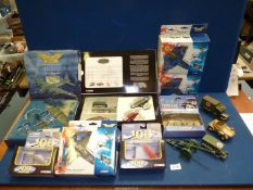 A quantity of boxed Corgi 'Battle of Britain' and '100 Years of Flight' model aeroplanes including;