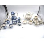 Two part coffee sets; one by Wedgwood blue and white ''Woodland'' and Royal Doulton ''Old Colony'',