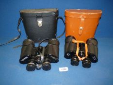 Two pairs of cased Binoculars; Regent 10 x 50 and Hanimex 10 x 50.