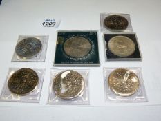 Seven crowns to include; Silver Wedding, 5 Queen Mother's 80th Birthday and Jubilee. Plus a £2 coin.