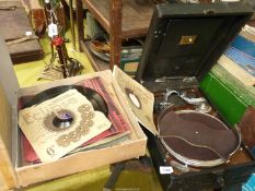 A 'His Masters Voice' Record player, with records.