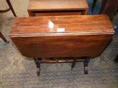 A Mahogany/Walnut Sutherland Table standing on turned legs/supports,