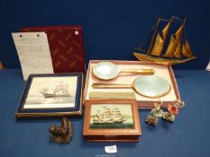 A quantity of miscellanea including brass model of a boat, boxed Art Deco style dressing table set,