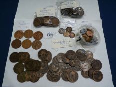 A quantity of pennies including Edward VII, George VI and Elizabeth II and a quantity of farthings.
