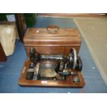 A National Victoria hand sewing machine with colourful detail, case a/f.