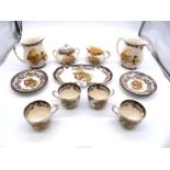 A small quantity of Palissy Gamer Series china including; four teacups and saucers, two jugs,