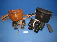 Two pairs of cased binoculars including Helios 8 x 3 and Carl Zeiss.