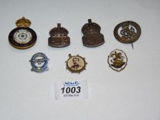 A small quantity of badges including two A.R.P.