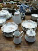 A quantity of Crown Ming china including; six soup bowls, six side plates, milk jug,