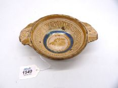 A rare early Hispano Moresque porringer, painted in copper lustre highlighted in blue,