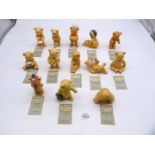 A group of thirteen Danbury Mint Teddy bears by Pam Storey including 'Yoga bear', 'Honey bear',