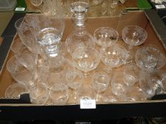 A quantity of glass with vine decoration including sherry and wine glasses,