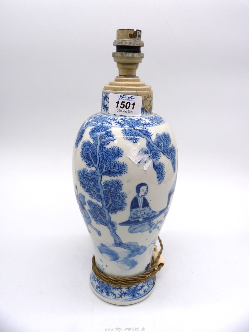 An oriental lamp with four character mark to base in blue, 13½" tall.