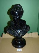 A chalk bust of Queen Victoria having a glossy black finish, 14" tall (has been repaired).