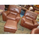 A pair of contemporary brown hide upholstered Reclining Fireside Armchairs and an associated