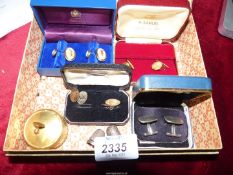 A small quantity of cufflinks including; a pair of enamel Halcyon Days, silver golfing pair, etc.