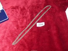 A heavy flattened link chain necklace marked 777 to the clasp, 23" long.