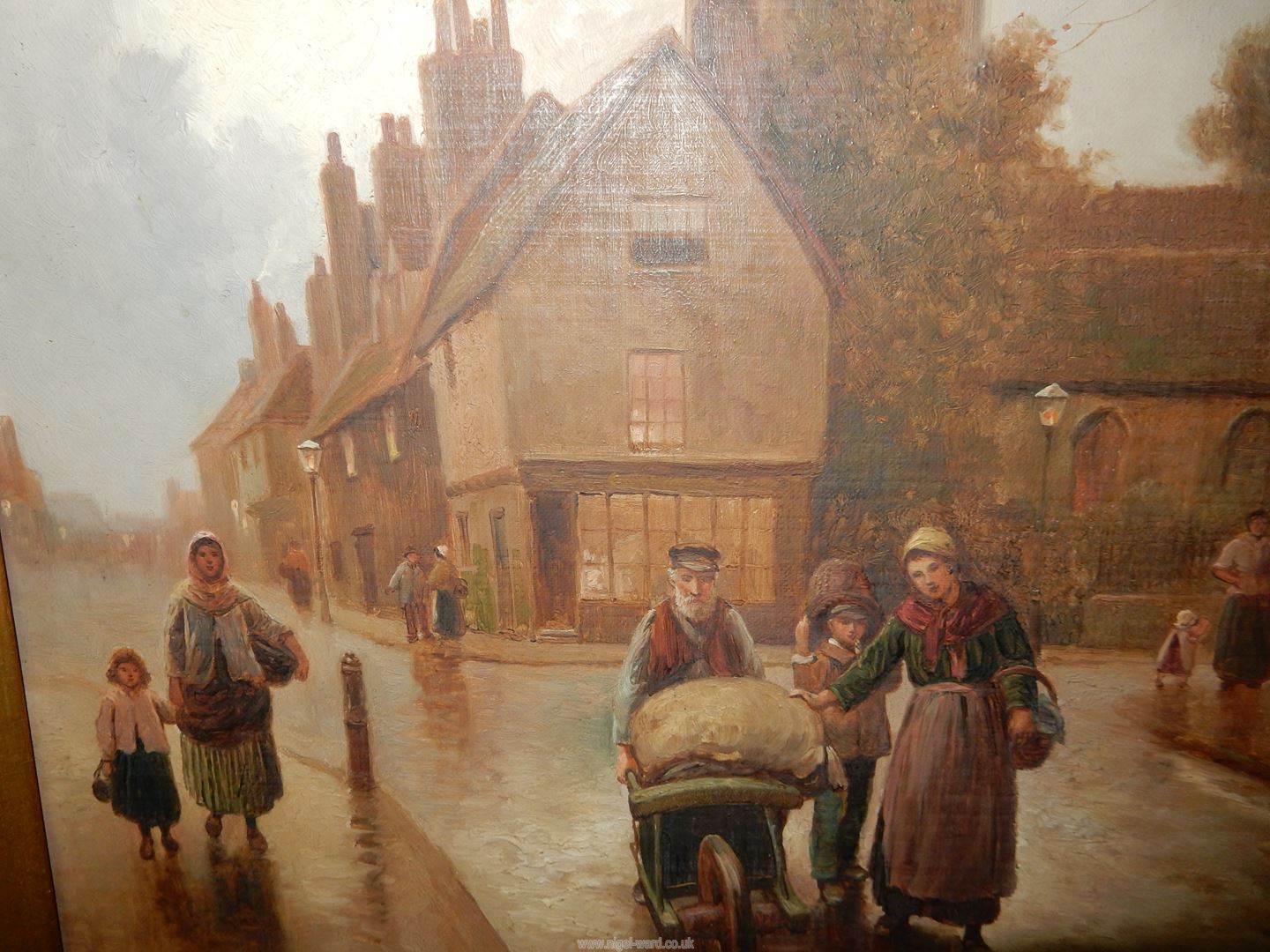 A large gilt framed Oil on canvas of a Village with figures walking down a street, - Image 5 of 7