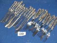 A set of twelve silver handled butter knives and forks, Sheffield 1924, maker WY (William Yates Ltd.