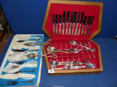 A quantity of silver plated kings pattern cutlery including a wooden canteen six setting of dinner