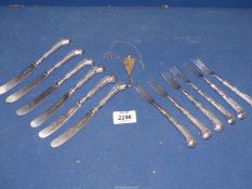 A set of six Walker and Hall butter knives and forks with silver Art Nouveau handles,