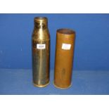 Two large Brass shell casings, 13 1/2'' and 11 1/2'' tall.